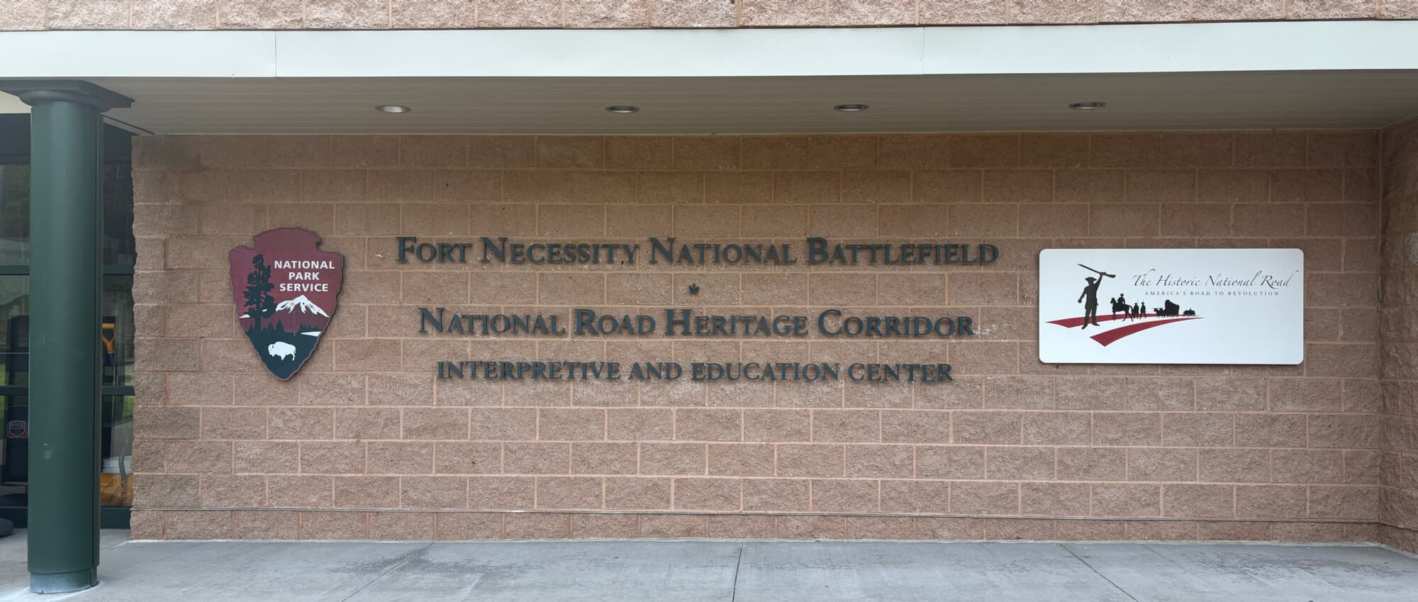 Signage for Fort Necessity National Battlefield and National Road Heritage Corridor interpretive and education center.